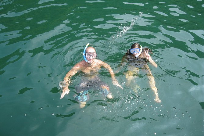 1 Day Boat Tour: HaLong Bay, Lan Ha Bay, Natural Beach and Full Moon Party - A busy day on the water from Cat Ba