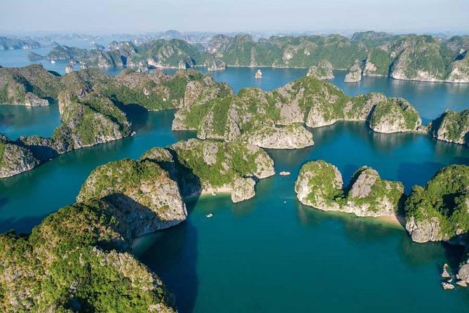 1 Day Boat Tour: HaLong Bay, Lan Ha Bay, Natural Beach and Full Moon Party - Kayaking through Bright Cave and Dark Cave