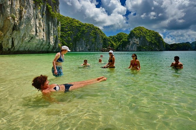 1 Day Boat Tour: HaLong Bay, Lan Ha Bay, Natural Beach and Full Moon Party - Guides King and Paul and the group size