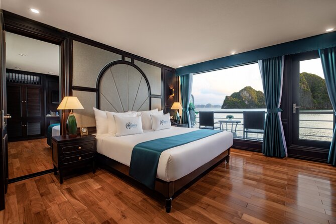 2-Day Luxury Halong Bay Aspira Cruise from Hanoi - A sunset with food, drinks, and a social deck