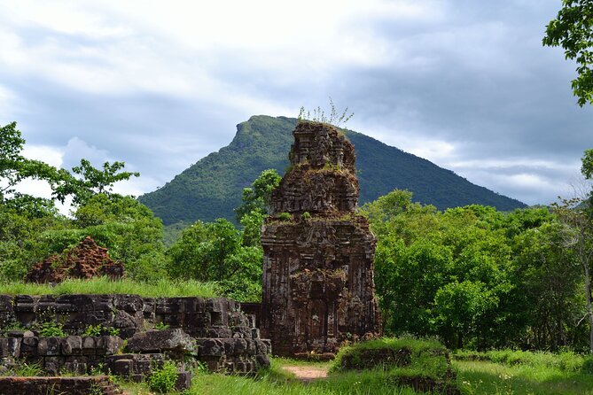 Adventure Bike Tour from Hoi An - Riding between rice fields and the mountains