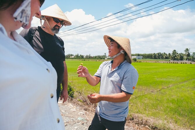 Authentic Mekong Delta Tour With Local Experts - Village life, fresh coconut, and Mekong whiskey