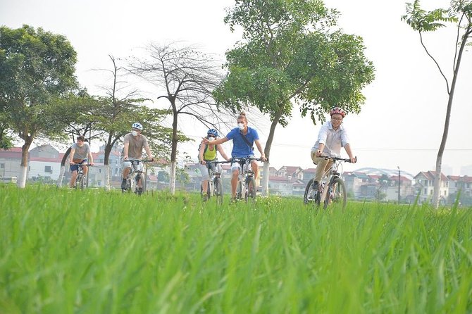 Bicycle Tours Hanoi: Full Day Bicycle Tours City & Countryside - City landmarks seen from the saddle