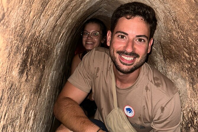 Black Virgin Peak, Cu Chi Tunnels & Cao Dai Temple - Private Tour - Walking through the Cu Chi Tunnels