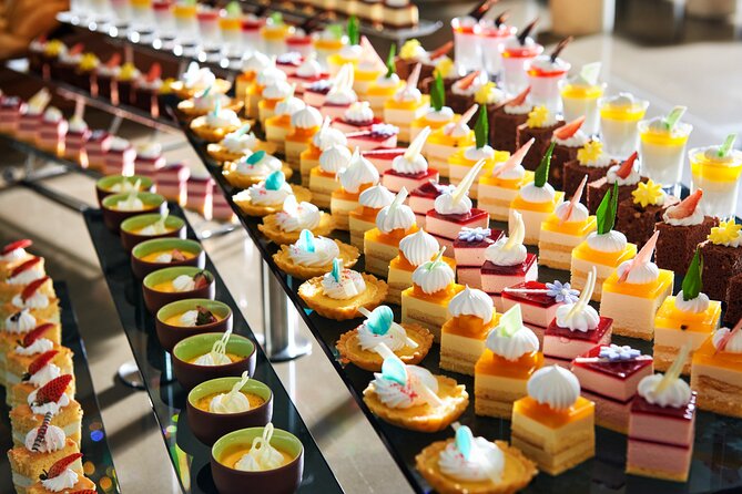 Buffet on Paradise Delight Dining Cruise Halong Bay Tour - Buffet dining with a view of Halong Bay