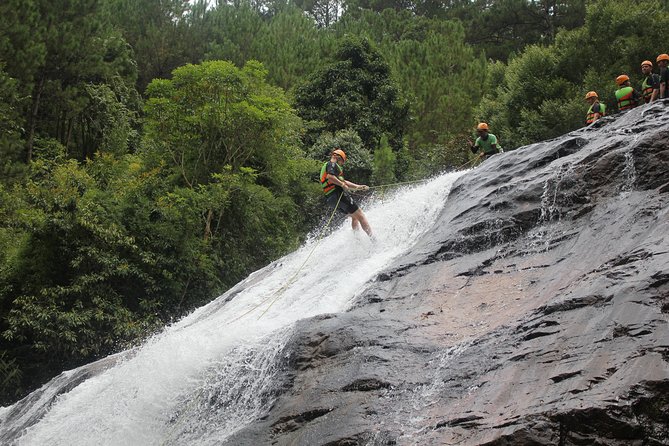 Canyoning Da Lat Vietnam - Water sliding puts you in the current