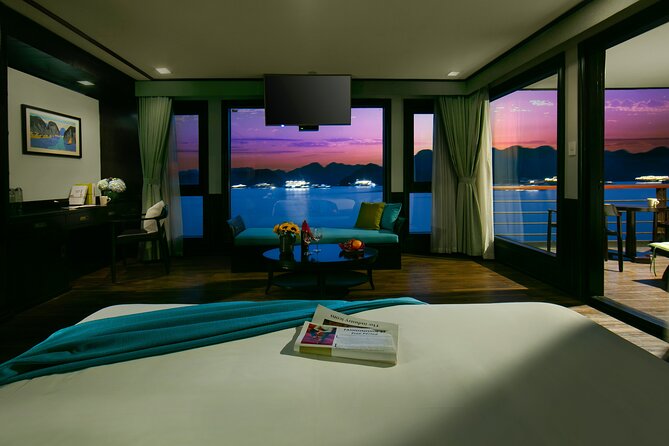 CELINA Cruise 6</em> Lan Hạ Bay 2 days 1 night with 2 ways transfer – Leaving Hanoi for Lan Ha Bay’ /></p>
<p><p>Your morning begins with pickup from a hotel in Hanoi’s Old Quarter. The stated collection window is 8:15 to 8:35, and the transfer uses the expressway. That is a useful time saver, since the bay is far enough from Hanoi that road travel forms a noticeable part of the first day.</p>
</p>
<p><p>The vehicle stops at a Pearl Center for a restroom break and optional shopping. You do not have to shop, so treat this as a practical pause rather than a major sightseeing stop. If you prefer a direct ride, the stop adds a little time, but it also breaks up the journey.</p>
</p>
<p><p>The tour includes an air-conditioned vehicle and two-way transfer service. Your confirmation arrives at booking, and pickup is offered from the Hanoi Old Quarter. If your hotel is outside that area, check the pickup arrangement before paying, since the stated service is specifically tied to the Old Quarter.</p>
</p>
<p><p>The cruise has a maximum of 59 people. That is not a small-group trip. The benefit is a wider range of facilities and a livelier onboard atmosphere, while the trade-off is that boarding, meals, and activities may feel more organized and less personal.</p>
</p>
<div class="twil" style="margin: 20px 0; padding: 15px 0;"><p>More Boat Tours in Hanoi</p><ul style="margin: 10px 0; padding-left: 0; list-style: none;"><li style="margin: 0 0 12px 0; padding: 0 0 12px 0; border-bottom: 1px solid #FBF0DB; line-height: 1.4;"><a href="https://vietnameseadventures.com/hanoi-ha-long-bay-day-cruise-swimming-meal-kayaking/">Hanoi: Ha Long Bay Day Cruise – Swimming, Meal, Kayaking</a><br><span style="font-size: 0.82em; color: #9F6A00;"><span style="color: #E39700;">★</span> 4.7 &nbsp;&middot;&nbsp; 7,415 reviews</span></li><li style="margin: 0 0 12px 0; padding: 0 0 12px 0; border-bottom: 1px solid #FBF0DB; line-height: 1.4;"><a href="https://vietnameseadventures.com/ninh-binh-full-day-tour-from-hanoi-to-hoa-lu-tam-coc-mua-cave-via-boat-bike/">Ninh Binh Full-Day Tour from Hanoi to Hoa Lu, Tam Coc & Mua Cave Via Boat & Bike</a><br><span style="font-size: 0.82em; color: #9F6A00;"><span style="color: #E39700;">★</span> 5.0 &nbsp;&middot;&nbsp; 4,384 reviews</span></li><li style="margin: 0; padding: 0; border-bottom: none; line-height: 1.4;"><a href="https://vietnameseadventures.com/amanda-cruise-ha-long-lan-ha-bay-all-inclusive-2d1n-3d2n/">Amanda Cruise – Ha Long, Lan Ha Bay – All Inclusive 2D1N & 3D2N</a><br><span style="font-size: 0.82em; color: #9F6A00;"><span style="color: #E39700;">★</span> 5.0 &nbsp;&middot;&nbsp; 4,358 reviews</span></li></ul></div><h2>Boarding CELINA and settling into the cabin</h2>
<p> Lan Hạ Bay 2 days 1 night with 2 ways transfer – Boarding CELINA and settling into the cabin’ /></p>
<p><p>The port arrival window is 11:15 to 11:45. From there, you board CELINA, receive a welcome drink and bottled water, and settle into your cabin before the first meal and activities begin.</p>
</p>
<p><p>The cabin includes a marble bathroom and multi-function air conditioning. That matters on a one-night cruise, because a private bathroom and reliable cooling make the boat feel much more comfortable after a day outdoors. The cruise also provides free onboard Wi-Fi, though the information does not promise a particular connection speed or coverage.</p>
</p>
<p><p>The boat includes a swimming pool, gym, and golf equipment, along with fishing gear. These facilities give you options during quieter stretches, but do not book the cruise solely for the gym or golf equipment. The main value is the bay scenery and the mix of water-based activities.</p>
</p>
<p><p>The schedule is active from the start. You will not spend two full days simply watching the islands drift past. That suits you if you like variety, but you may find the pace busy if your ideal cruise means long, unplanned hours on deck.</p>
</p>
<h2>Seeing Lan Ha Bay from the water</h2>
<p><img width="669" height="446" decoding="async" src=