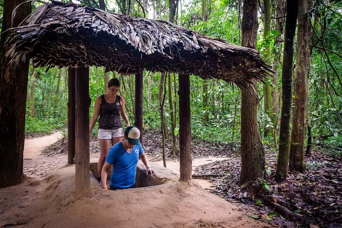 Cu Chi Tunnels and Mekong Delta 1 Day Tour With Small Group - Coconut candy, orchard fruit, and the smaller canal boat