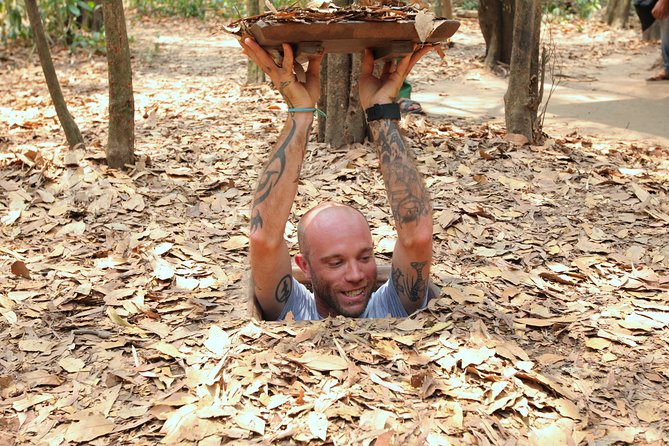 Cu Chi Tunnels and Mekong Delta Full Day Tour - Max 12 - Entering the Cu Chi underground world