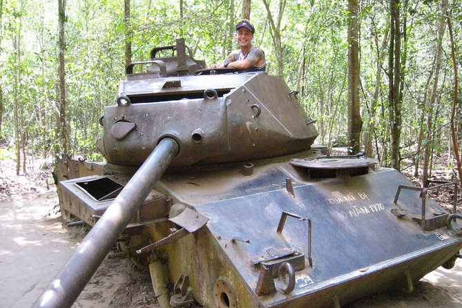 Cu Chi Tunnels and Mekong Delta Signature Tour - Fruit, honey tea, music, and coconut products