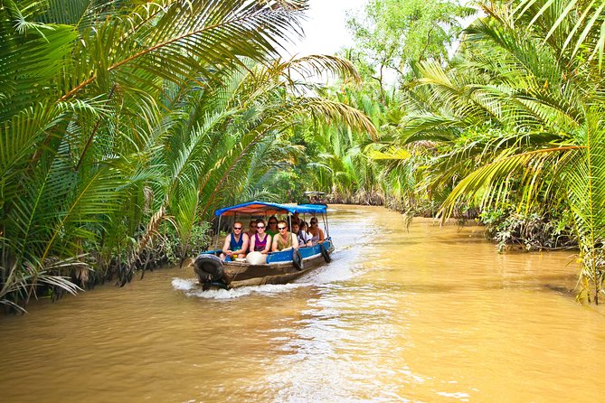 Cu Chi Tunnels and Mekong Delta Signature Tour - Entering the Cu Chi Tunnels