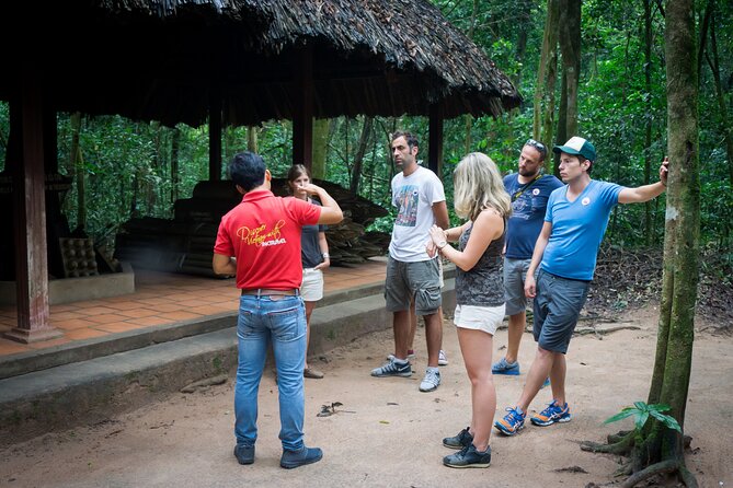 Cu Chi Tunnels Half-Day Tour: Big Group Vietnam War Experience - Hidden entrances, kitchens, and underground work