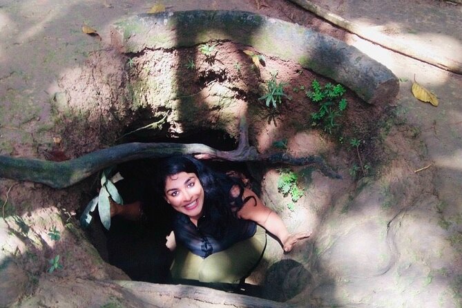 Cu Chi Tunnels tour In The Morning by DGT - Crawling through the real tunnel sections