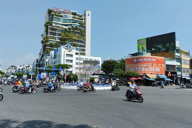 Da Nang Food Tour Motorbike & Sightseeing By Ao Dai Lady Rider - Dragon Bridge brings the city’s signature view