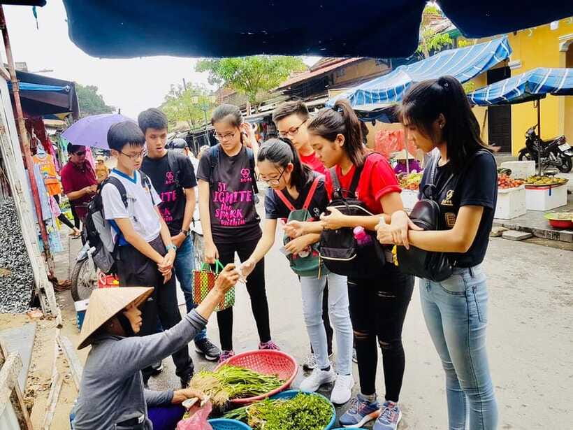 Da Nang/Hoi An: Market Tour, Basket Boat Ride, Cooking Class - Sitting down to eat what you prepared