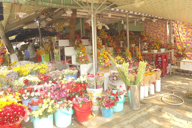 Da Nang Night Motorbike Tour & River Cruise Riding By Lady Rider - The Sun Wheel and night market bring a livelier finish