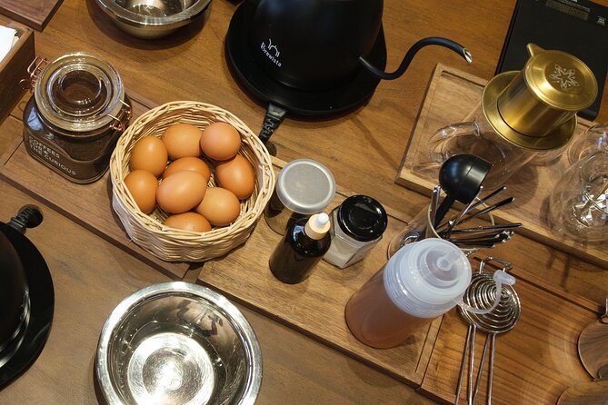 Decadent Vietnamese “Egg Coffee” Workshop in Hồ Chí Minh City - Making the egg cream with condensed milk and honey