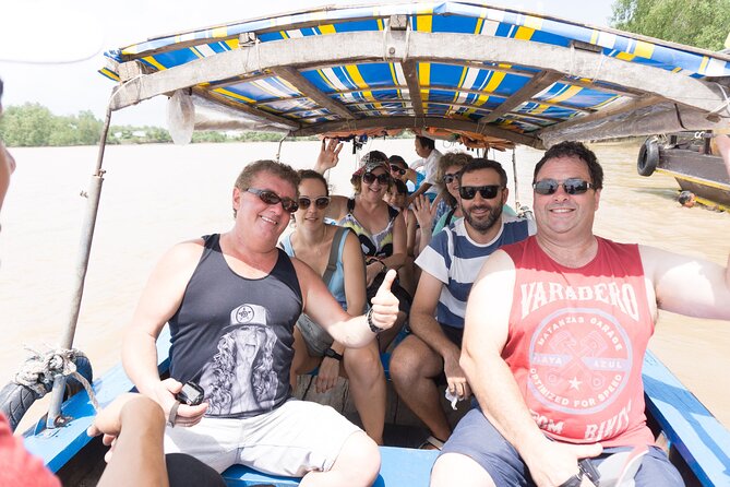 Essential Mekong Delta: Highlights Tour from Ho Chi Minh City - Honey tea, beekeeping, and coconut candy
