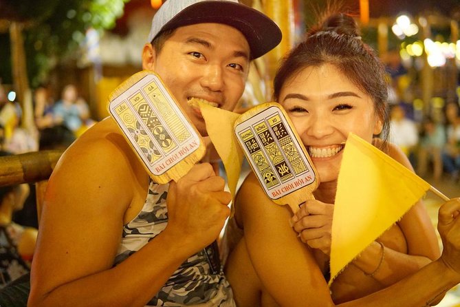 Evening Walking Food Tour, folk game and lantern boat - Vietnamese bingo and the dap nieu folk game