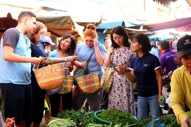Experience Local Market and Boat Ride with Cooking Class - The road to Cam Thanh changes the pace