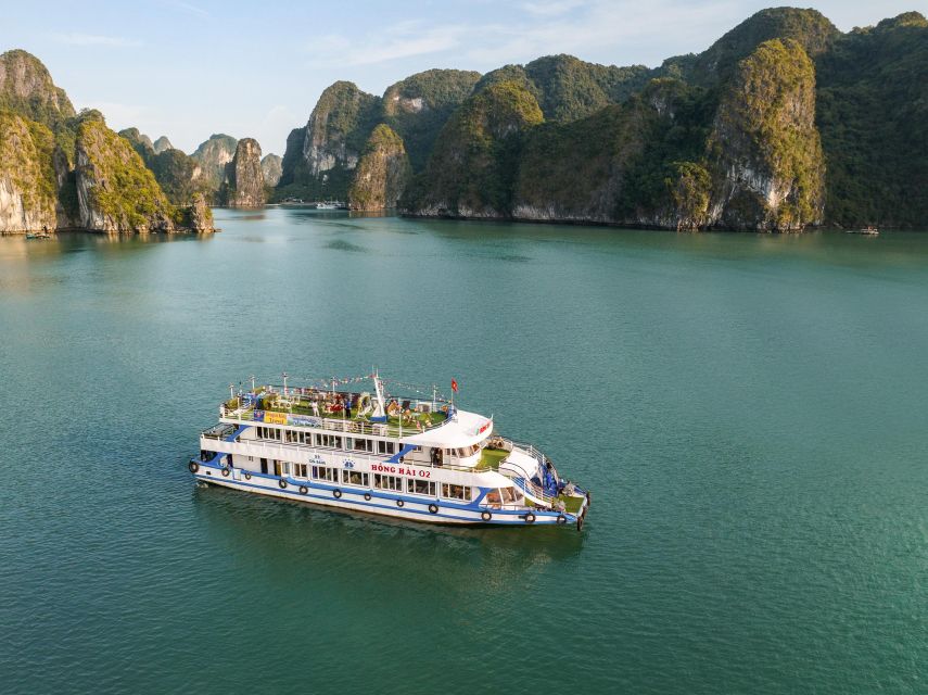 From Hanoi: Halong Bay Day Trip w/ Cave, Island & Kayak - Walking through Surprising Cave