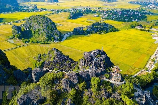 From Hanoi: Hoa Lu, Tam Coc, and Mua Cave Scenic Day Trip - Tam Coc by boat, with limestone cliffs overhead