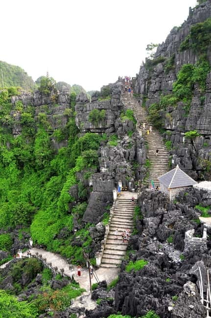 From Hanoi: Tam Coc Boat Trip and Hoa Lu & Mua Cave Tour - Tam Coc by bamboo boat