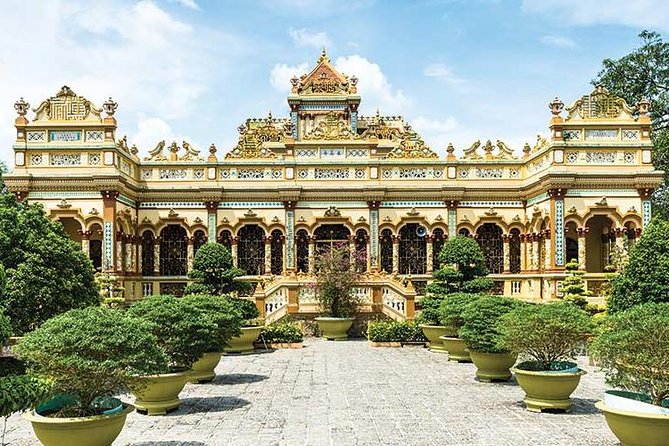 From HCM City: Mekong Delta Tour with Sampan Journey - Unicorn Islet, fruit, tea, and folk music