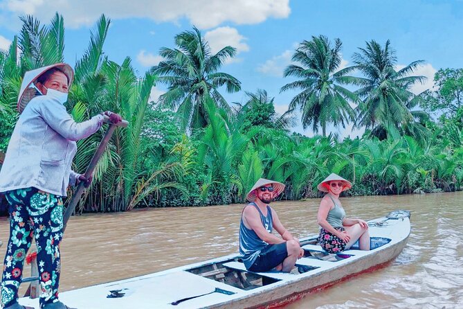 From HCM City: Mekong Delta Tour with Sampan Journey - The sampan through coconut-lined canals