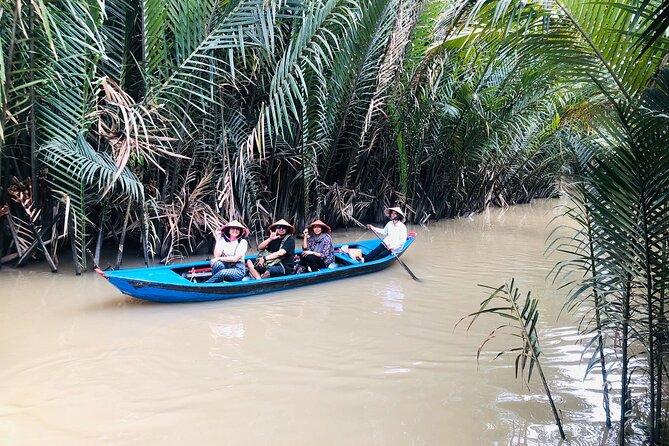 From Ho Chi Minh City: Discover Mekong Delta & Coconut Village - The Tien River shows the working delta