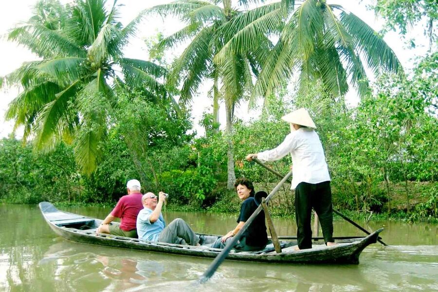 From Ho Chi Minh City: Mekong Delta VIP Tour by Limousine - Walking through orchards before lunch