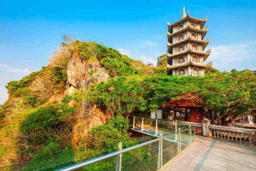 From Hue: Epic Coastline & Hidden Gems Tour to Hoi An - Marble Mountains: caves, pagodas, and a tight clock