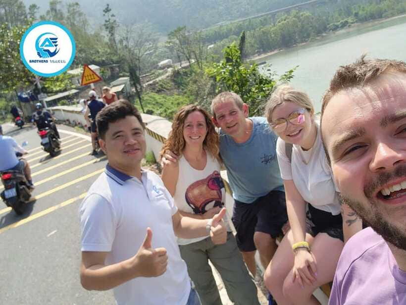 From Hue: Hoi An Guided Bus Tour with 4 Sightseeing Stops - Marble Mountains: caves, pagodas, and a final climb