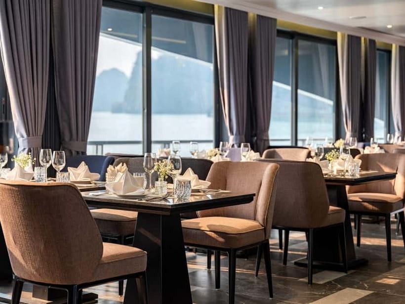 Full Day: Fabulous Halong Bay Tour with Taliya Cruise 5<em> – Key points at a glance’ /></p>
<ul>
<li><strong>A full day on the bay:</strong> Expect roughly seven and a half hours on the water, plus the Hanoi road transfer.</li>
<li><strong>Dark and Bright Cave by bamboo boat:</strong> A local rower takes you through a quiet cave and into a hidden lagoon.</li>
<li><strong>Real time for swimming:</strong> Ao Ech in Lan Ha Bay includes kayaking and a chance to swim.</li>
<li><strong>More than scenery:</strong> Lunch, a spring-roll demonstration, afternoon tea, and a sunset gathering fill out the day.</li>
<li><strong>Useful guide feedback:</strong> Frank, Vin, and Chung Hoeng Van are names connected with different departures, though your guide may be someone else.</li>
<li><strong>Strong value at $57:</strong> The price includes lunch, entrance fees, activities, and transport if you choose the transfer option, but drinks cost extra.</li>
</ul>
<h2>From Hanoi to Tuan Chau Marina</h2>
<p><img width="820" height="614" decoding="async" src=
