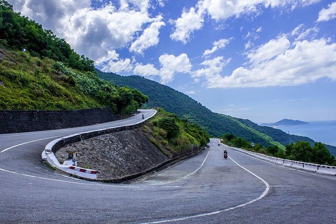 Full-Day Private Motorbike Tour in Hai Van Pass with Lunch - Lang Co Beach pairs lunch with a coastal pause