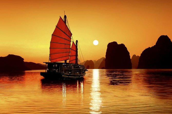 Group Halong Bay Day Cruise Including Hotel Transfers from Hanoi - Boarding the boat among the limestone islands