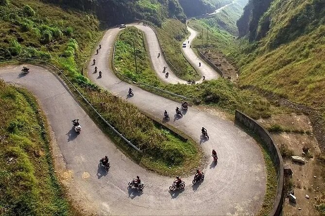 Ha Giang Loop 3 days and 2 nights Motorbike Tour with Easy rider - Day two: Tham Ma Pass, the H’mong King Palace, and Lung Cu