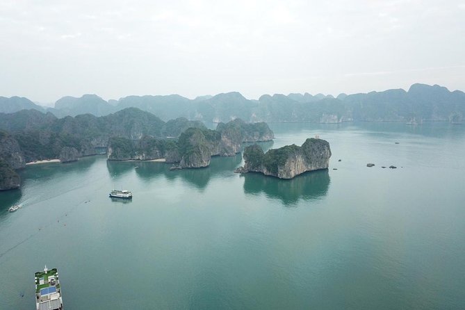 Ha Long Bay Six Hours Trip Kayaking & Swimming on Beach - Surprising Cave and the first major stop