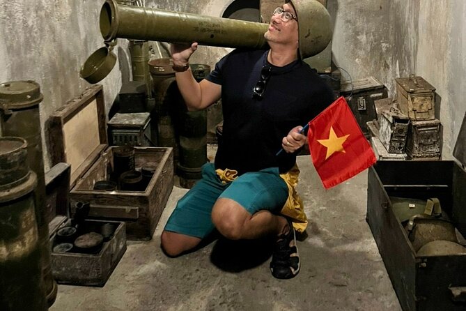 Half-Day Cu Chi Underground Tunnels Tour with Pick Up - Entering a hand-dug underground village