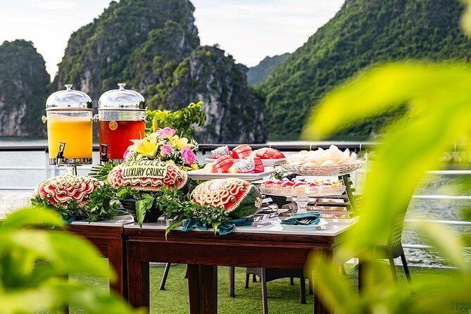 Halong Bay Full Day With Cave, Kayaking And Swimming - Swimming and views at Titop Island