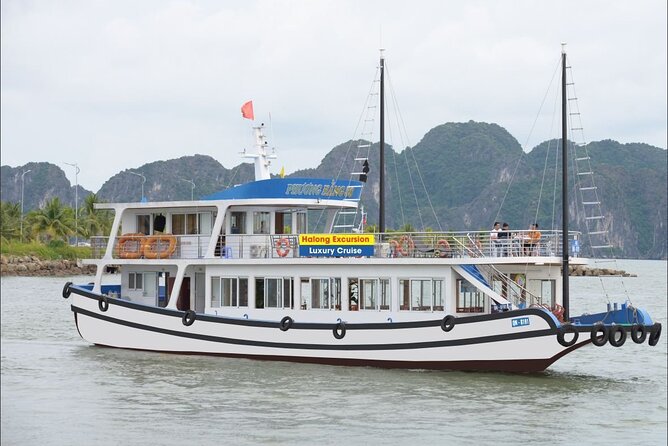 Halong Excursion Cruise with Kayaking, Swimming & Cave Visit - Seafood lunch with a few extra charges to watch