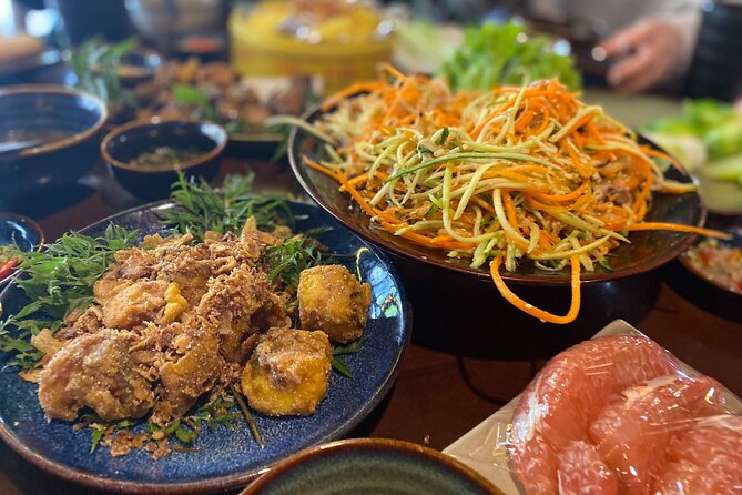 Hanoi: 7 Tasting Street Food Walking Tour and Train Street - Hoan Kiem Walking Street and the Old Quarter atmosphere