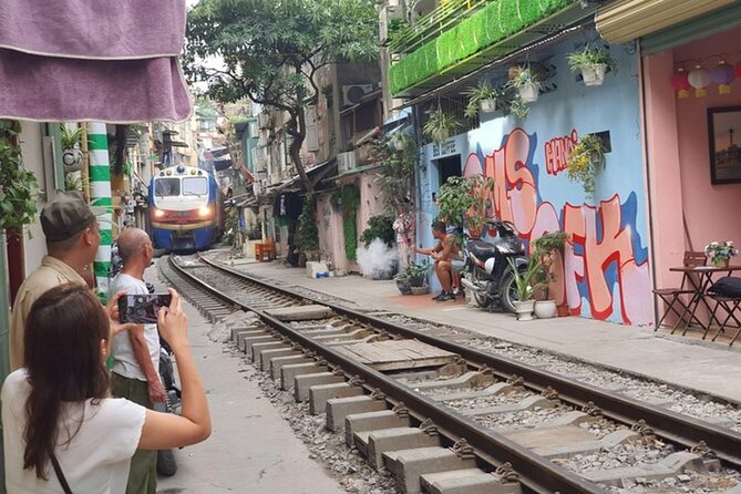 Hanoi All-In-One Tour: Highlights & Train Street & Culture & Fun - One hour around the Ho Chi Minh Mausoleum