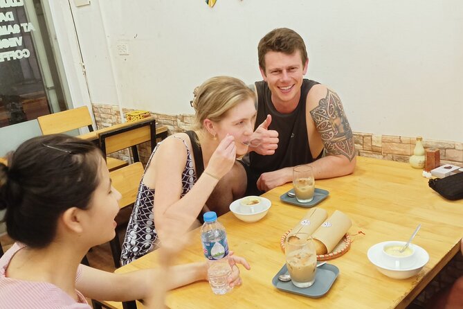 Hanoi Egg Coffee & Coconut Coffee Making Class with Free Banh Mi - Mixing coconut coffee for a second taste