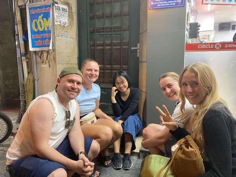Hanoi: Guided Street Food Tour with Train Street Experience - Waiting beside the tracks with one included drink