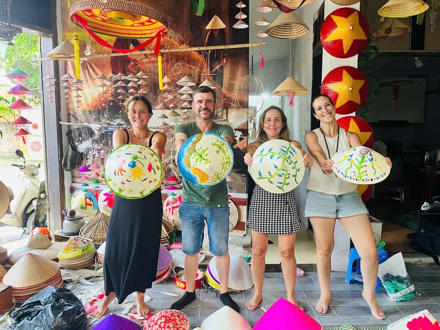 Hanoi: Incense Village, Hat, Lacquer, & City Highlights Tour - Painting a conical hat in Chuong