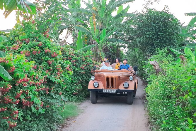 Hanoi Jeep Tour: Red River Countryside+ Backstreet+ Train-street - West Lake, Truc Bach, and quieter Hanoi lanes