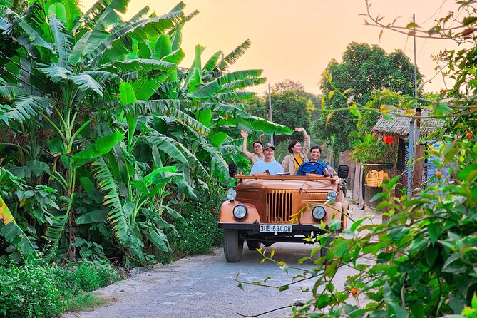 Hanoi Jeep Tour: Red River Countryside+ Backstreet+ Train-street - City landmarks from a military-style Jeep