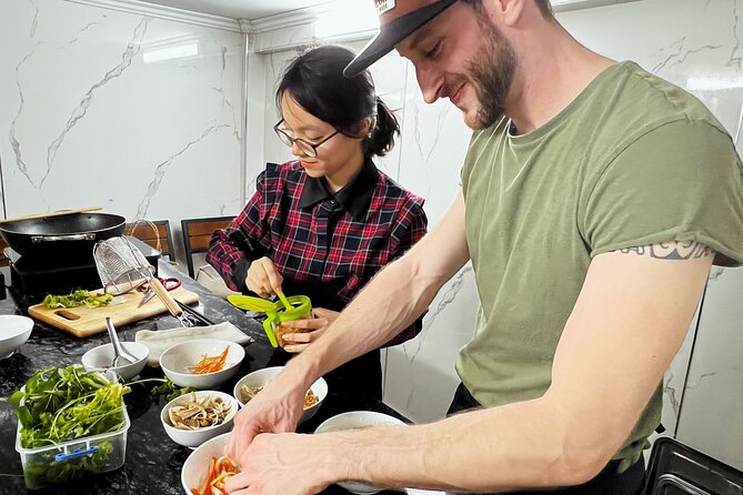 Hanoi Maya Kitchen: Traditional Cooking Class & Market Tour - Balancing sweet and sour papaya salad