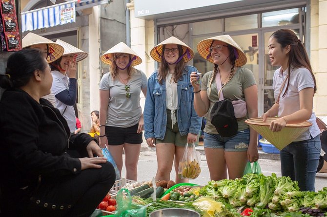 Hanoi Maya Kitchen: Traditional Cooking Class & Market Tour - Rolling pho and mixing pho